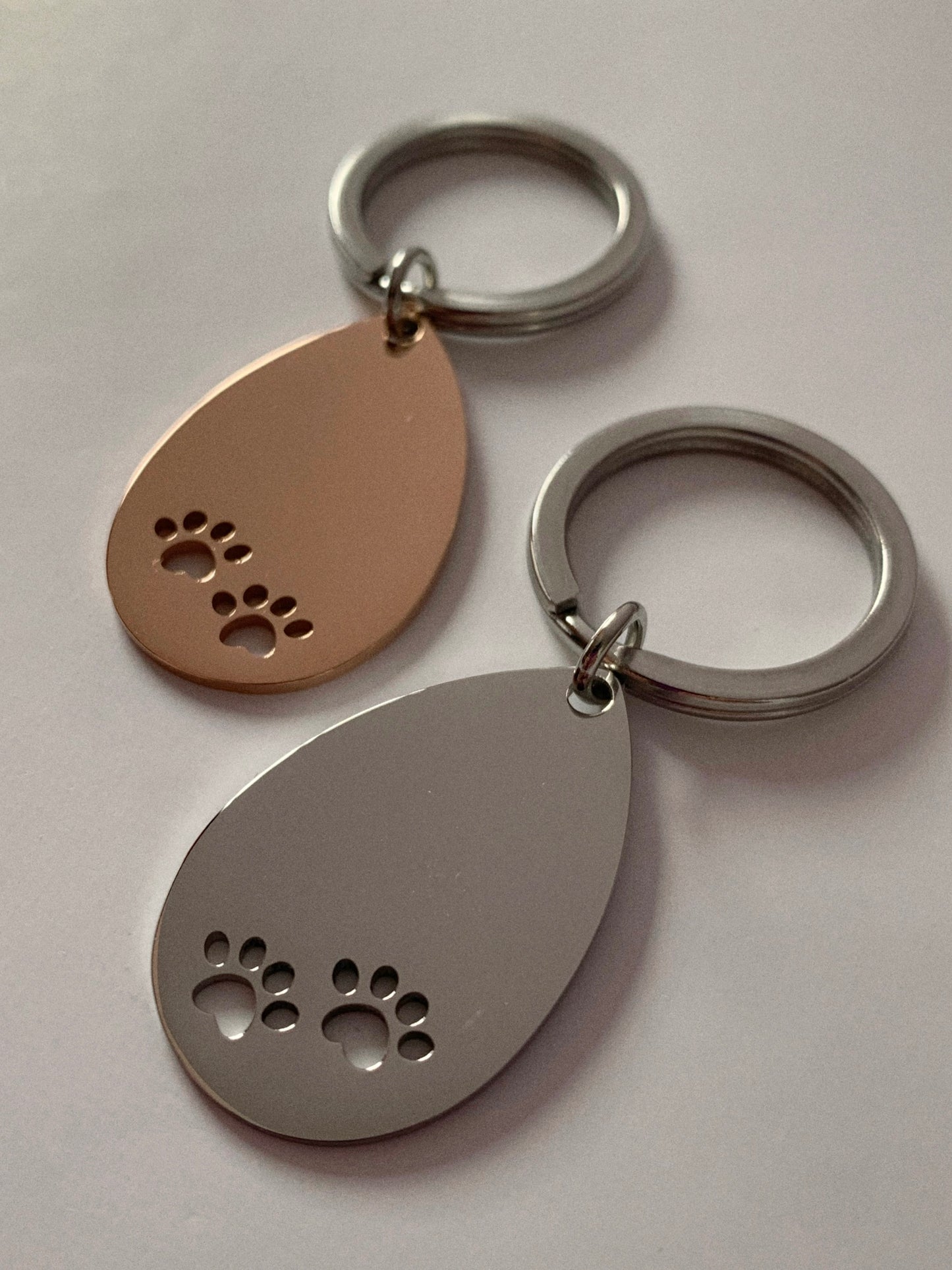 Llavero patitas 🐾 - Hey.Vortex