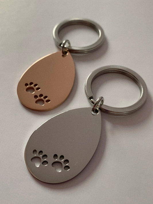 Llavero patitas 🐾 - Hey.Vortex