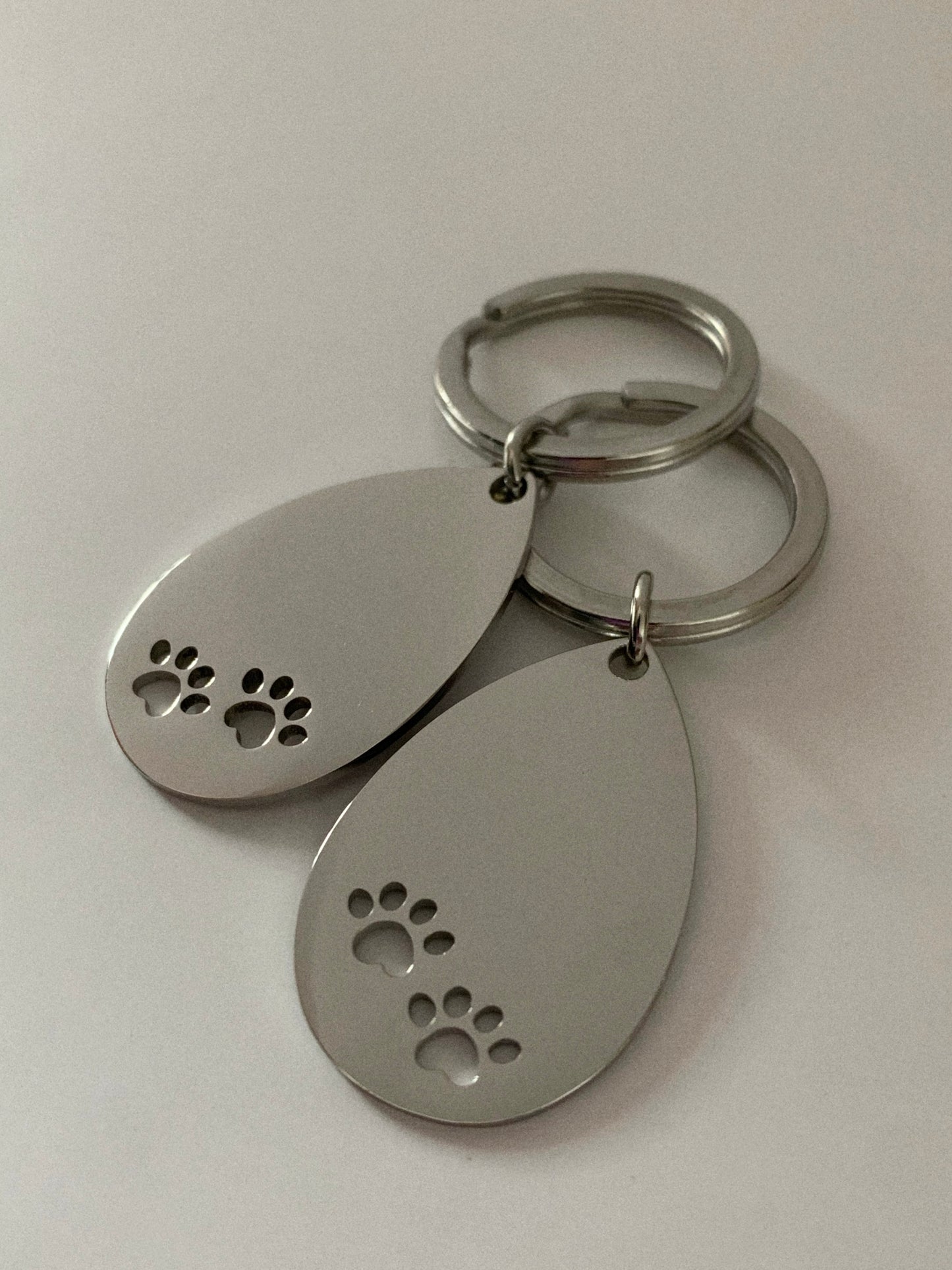 Llavero patitas 🐾 - Hey.Vortex