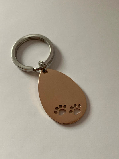 Llavero patitas 🐾 - Hey.Vortex